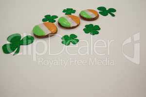 St. Patricks Day cookies decorated with irish flag surrounded with shamrocks