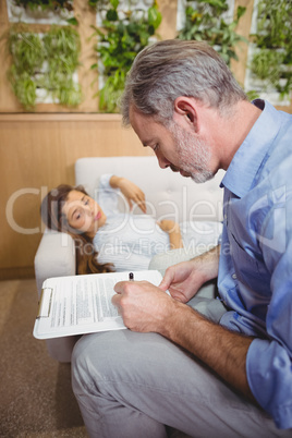 Doctor consulting female patient