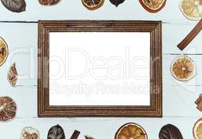 Empty wooden frame on a white wooden surface,