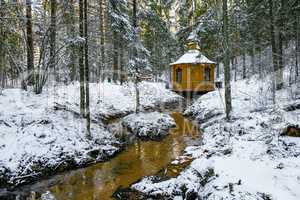 Winter landscape with small river