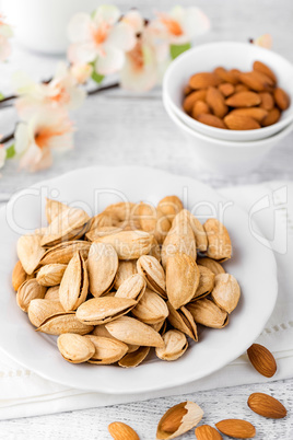 Almond nuts on white background