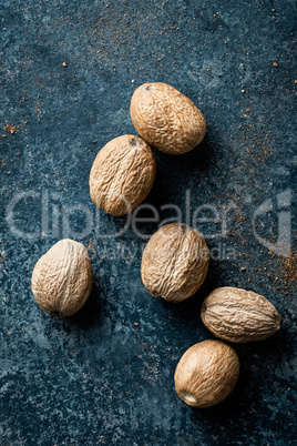Nutmeg on dark background directly above copy space