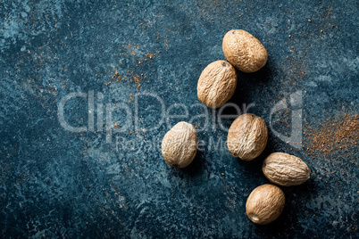 Nutmeg on dark background directly above copy space