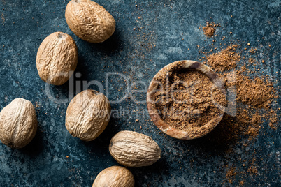 Nutmeg on dark background directly above copy space