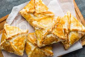 Crunchy puff pastry pies, homemade baking, top view