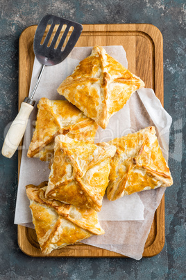 Crunchy puff pastry pies, homemade baking, top view