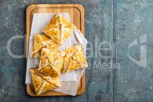 Crunchy puff pastry pies, homemade baking, top view