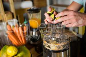 Shop assistant preparing avocado juice