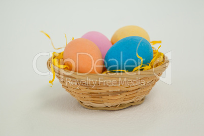 Painted easter eggs in basket