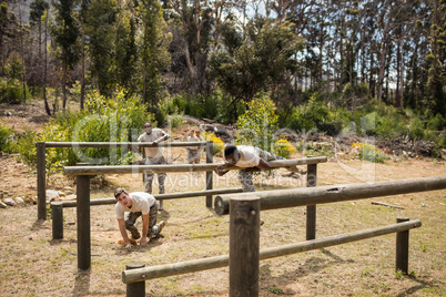 Military soldiers training on fitness trail