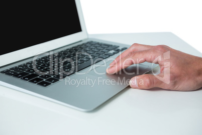 Hand of executive using laptop
