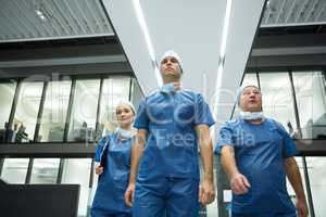 Surgeons walking in hospital