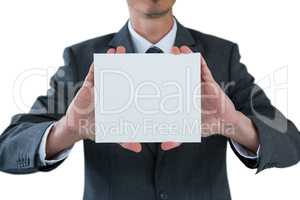 Businessman holding blank placard