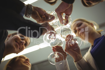 Businesspeople toasting glasses of champagne