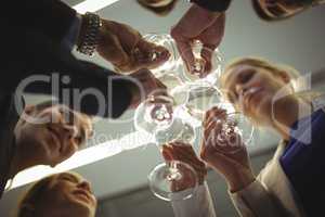 Businesspeople toasting glasses of champagne