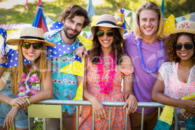 Group of friends standing together in park