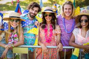 Group of friends standing together in park