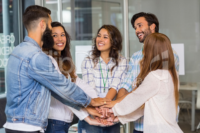 Group of business people forming a hand stack