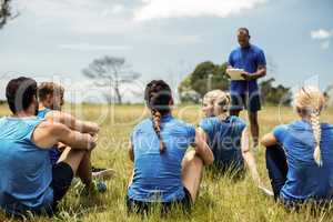 Fit people sitting together