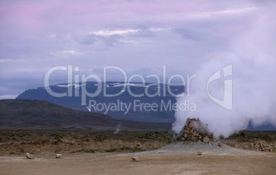 Smoking fumaroles in the geothermal area Hverir, Iceland.