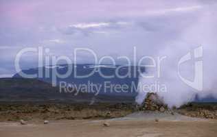 Smoking fumaroles in the geothermal area Hverir, Iceland.