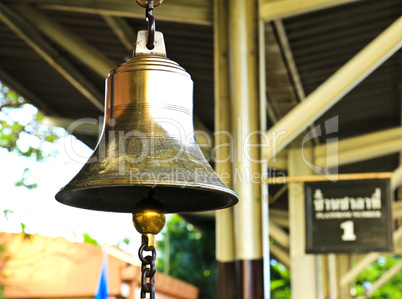Old bell in train station , Thailand.