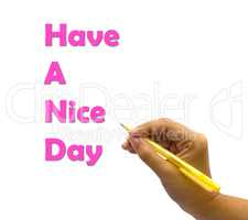 A hand writing the words Have A Nice Day.