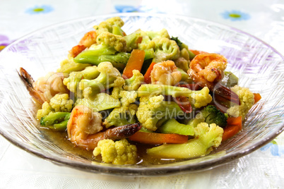 Stir-fry vegetables and shrimp.