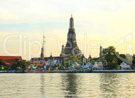 Wat Arun, the Temple of Dawn, stands on the Chao Phraya river in