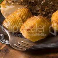 Stuffed cauliflower with mince and Hasselback potatoes