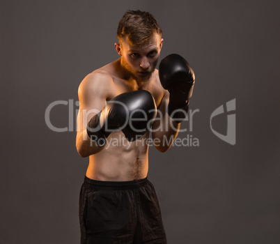 Boxer man during boxing training