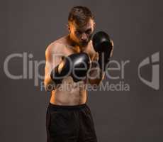 Boxer man during boxing training