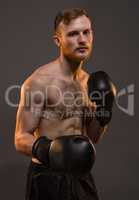 Boxer young man with boxing gloves