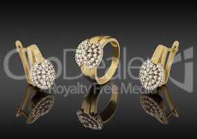 gold ring and earrings with diamonds