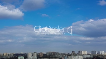 Clouds over the Rooftops of the City. Rotatable Time Lapse