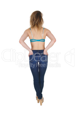 Young woman standing from back.