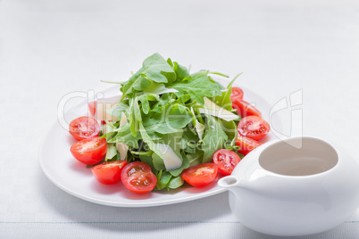 Salad with arugula, tomatoes