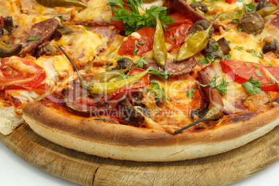 Pizza with sausage, mushrooms and hot pepper.