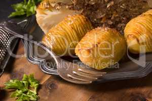 Stuffed cauliflower with mince and Hasselback potatoes