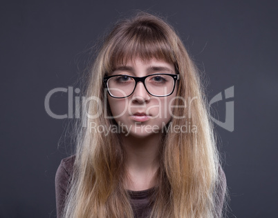 Portrait of teenage girl in glasses