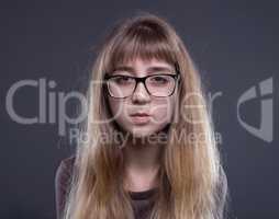 Portrait of teenage girl in glasses