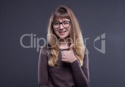 Happy teenage girl in glasses