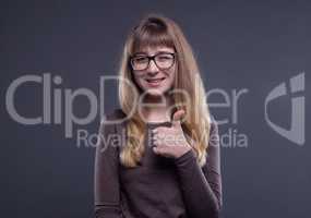 Happy teenage girl in glasses