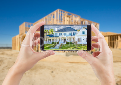 Female Hands Holding Smart Phone Displaying Photo of House with