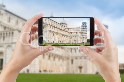 Female Hands Holding Smart Phone Displaying Photo of The Leaning