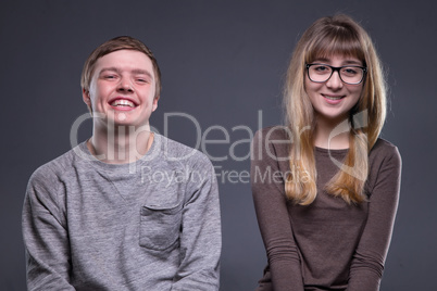 Portrait of happy teenage couple