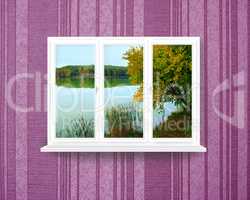 panoramic window with view to forest lake