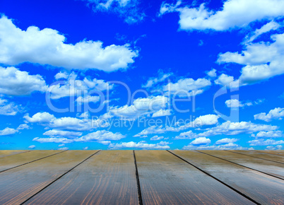 stand from wooden boards with blue sky