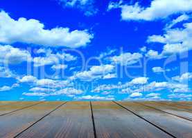 stand from wooden boards with blue sky