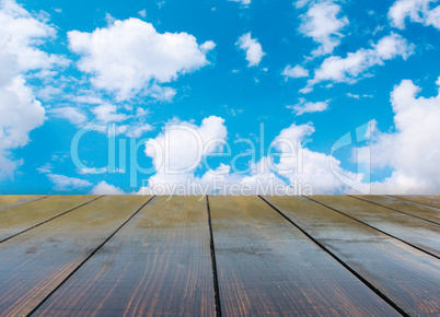 stand from wooden boards with blue sky